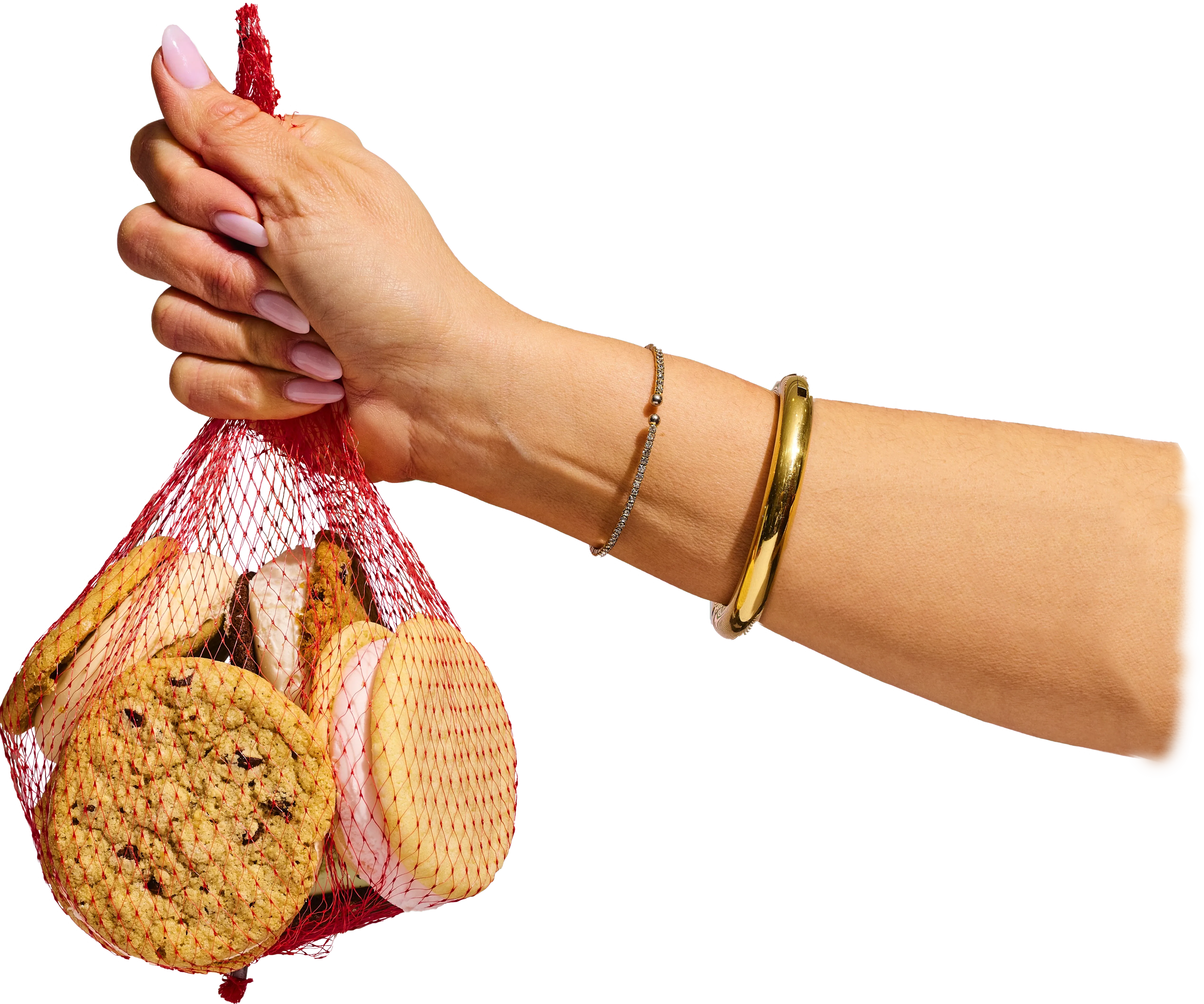 Hand holding a mesh bag of Thelma's ice cream sandwiches